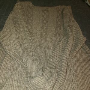 Kim Roger's cable knit sweater